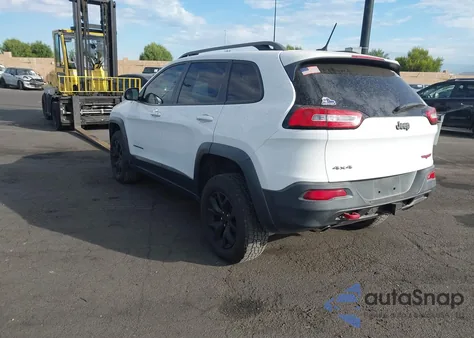 2014 Jeep Cherokee Trailhawk from USA, damaged, VIN 1C4PJMBS5EW321439